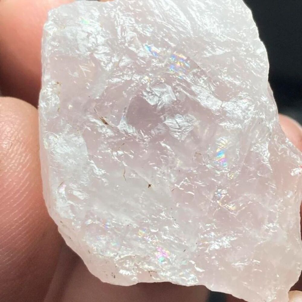 Pink raw rose quartz crystal